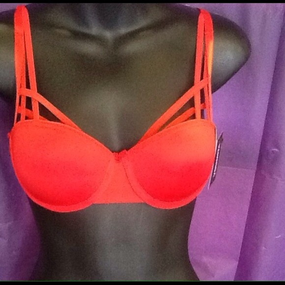 34B strappy, sexy, sultry bra.