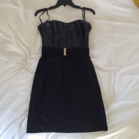Black fitted mini dress. Top part faux leather. - Picture 1 of 3