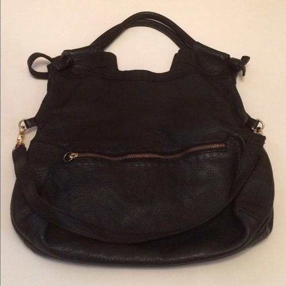 Black leather handbag with strap