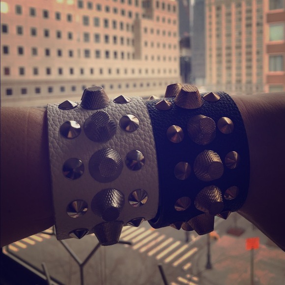 Studded cuffs.  Adjustable size.