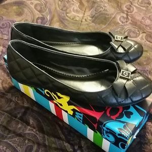 C. Wonder Napa leather bow flats