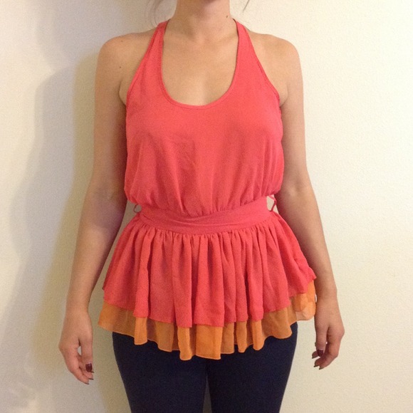 Coral and orange peplum ruffle top