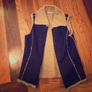 Sherpa lined faux leather vest