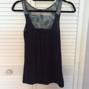 Blue tank top with designed straps and back