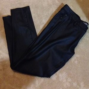 glossed black skinny pants