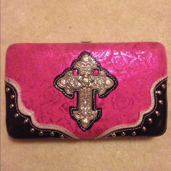Blingy Pink cross wallet with roses in background