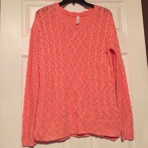 Coral sweater.