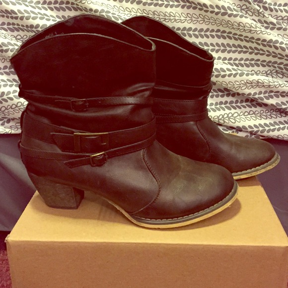 Brown cowgirl style booties with a heel