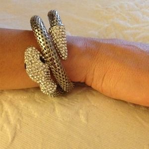 Coil wrapped snake rhinestone bracelet.