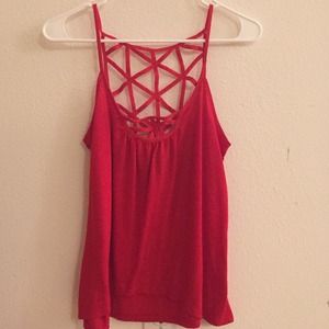 Girly, flowy red top with back design.
