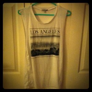 I am selling a Size small Charlotte Russe tank top