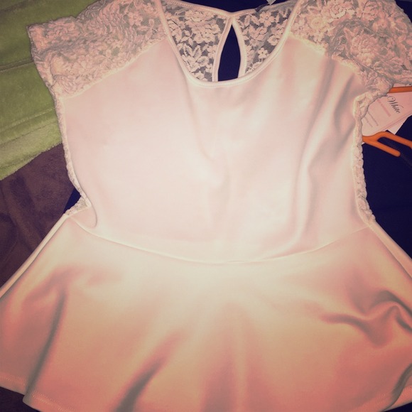 NWT: All white peplum top w/lace sleeves and back.