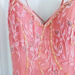 Coral beaded even prom gown