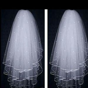 New wedding veil with pearls and stain trim