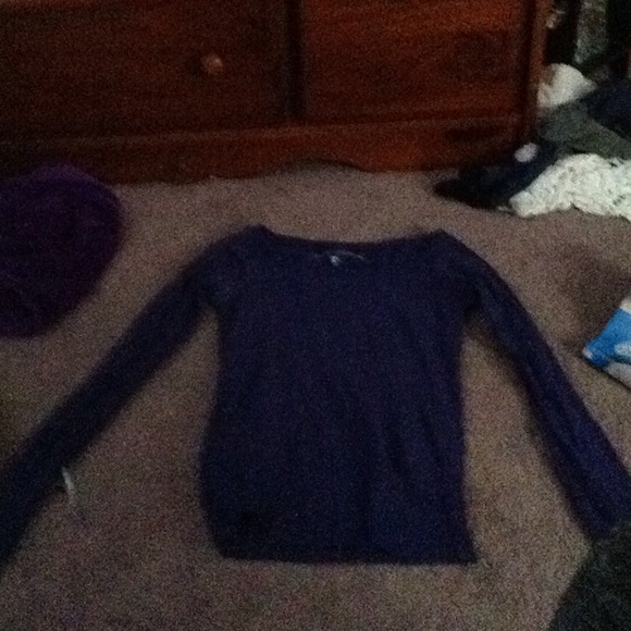 This is a blue shirt with  long sleeves