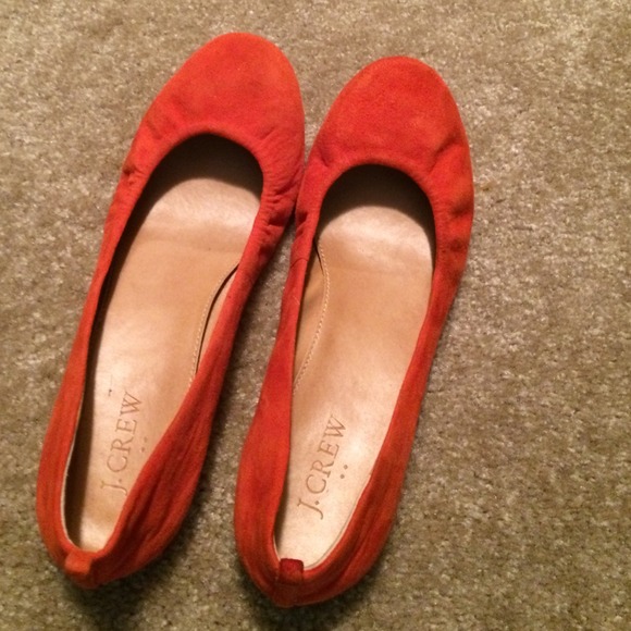 Orange suede flats