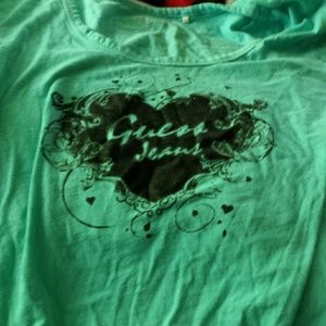 Tshirt that says guess jeans on the front