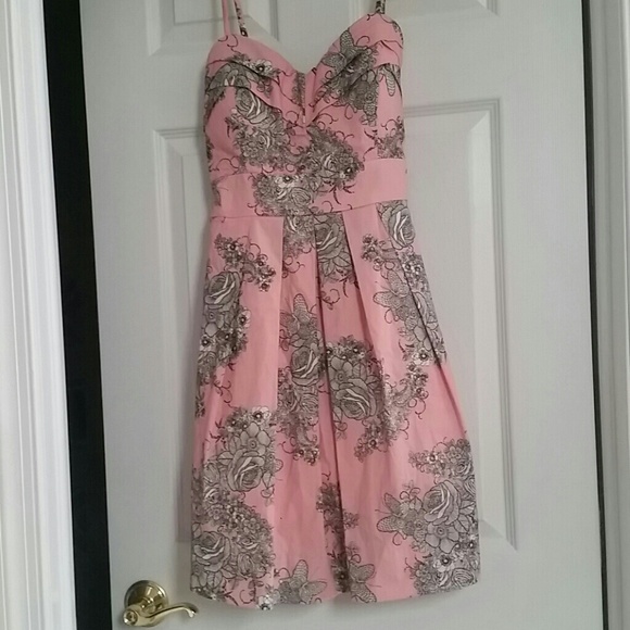 Pink dress with black and white flower detail