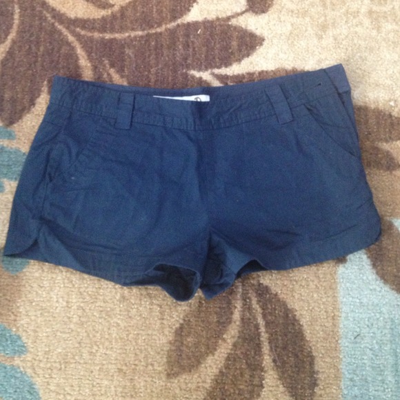 Navy blue shorts.