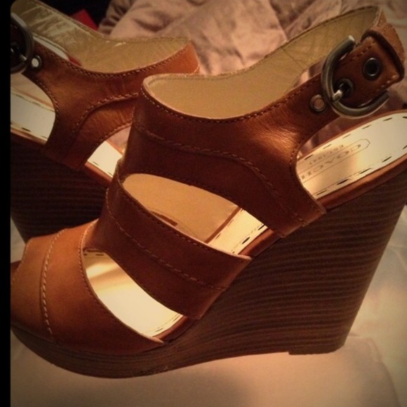 Size 9 coach wedges feels like 8 1/2.