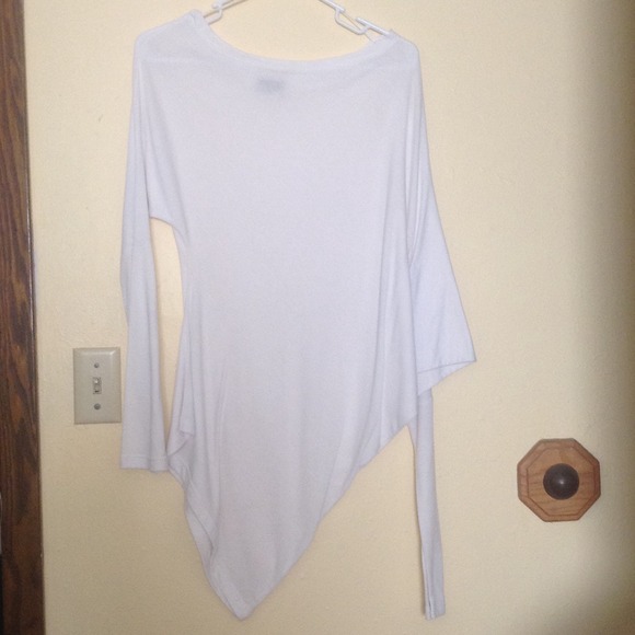 2 Wet Seal asymmetrical tops! Black and white!
