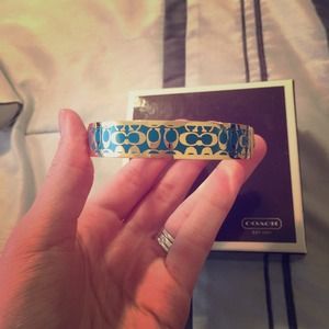 Gold and blue Coach bracelet
