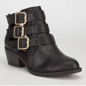 Black cutout buckled boots