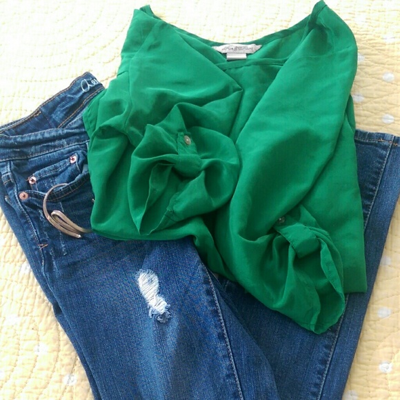 Distressed jeans and silk top