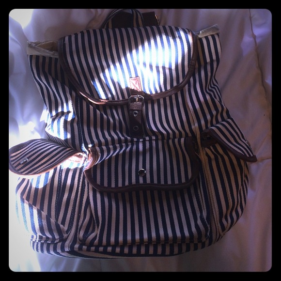 Navy & cream backpack w/brown trim & straps
