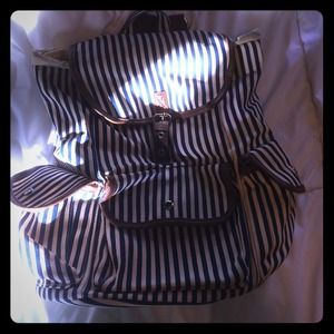 Navy & cream backpack w/brown trim & straps