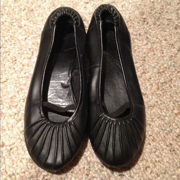 Black leather flats