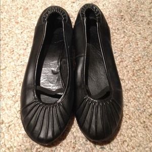 Black leather flats