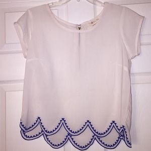 Never worn!! White shirt, blue trim. Size medium!