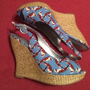 Blue and red peep toe, sling back espadrilles.