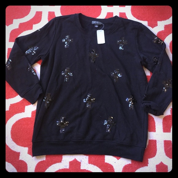 Black sweater w/ sparkle crosses