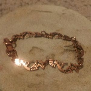 Brass kokopelli bracelet.