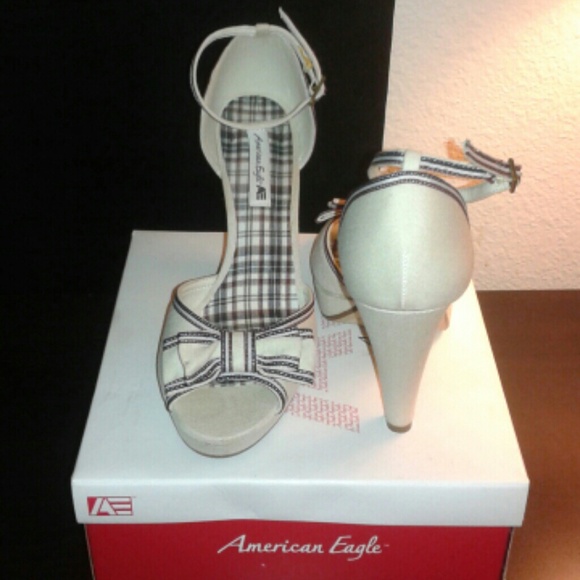 Off white peep toe heels with bow accent