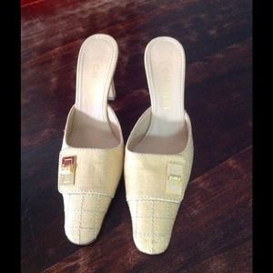 Pale yellow Chanel Mules