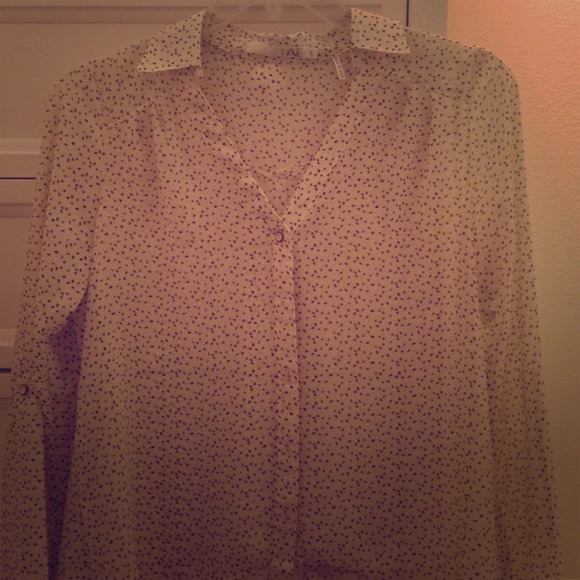A sheer long sleeved blouse - Picture 1 of 2