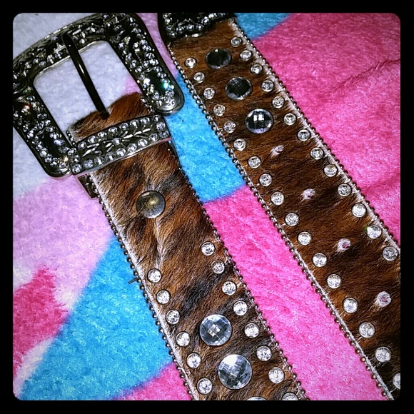 Rinestone cowhide belt.
