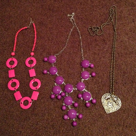 Three statement necklaces!