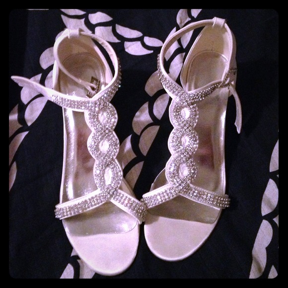 Ivory with gem heels. Never been worn-brand new