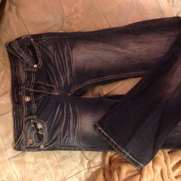 Boot cut blue jeans.