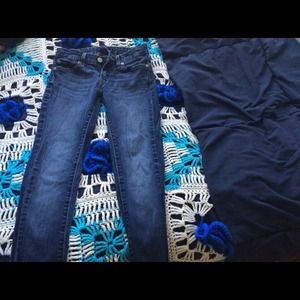 Levi's medium wash 535 leggings