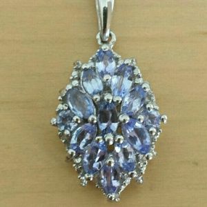 New. Tanzanite and Diamond Pendant