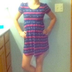 A pattern dress with all different kinds color.