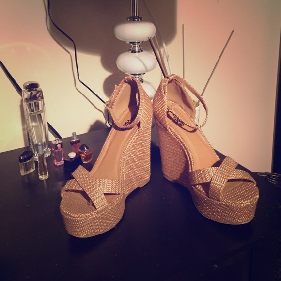 Pinkish brown multi colored wedges.