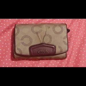 Coach small purple and tan wallet