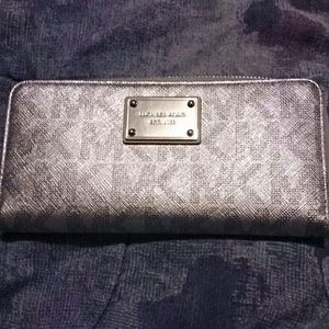 Authentic Micheal Kors silver wallet