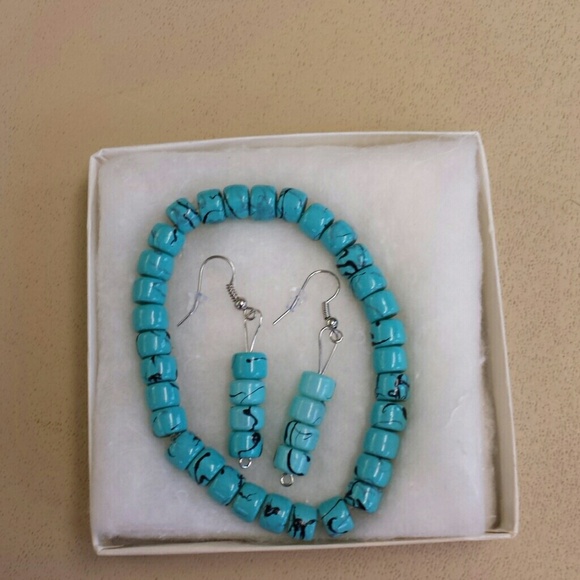 Two-piece. Earrings. And . bracelet